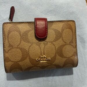 Rare Coach canvas and red corner zip wallet